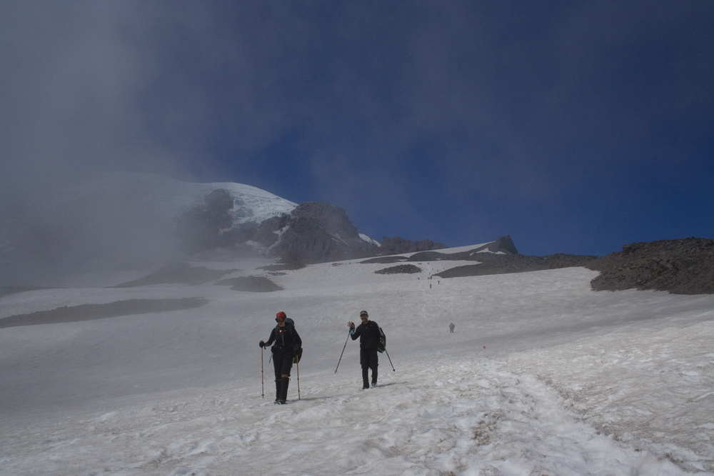 Hikers decending Mount Rainier, WA
